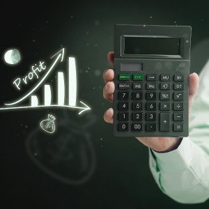 a hand holding a calculator